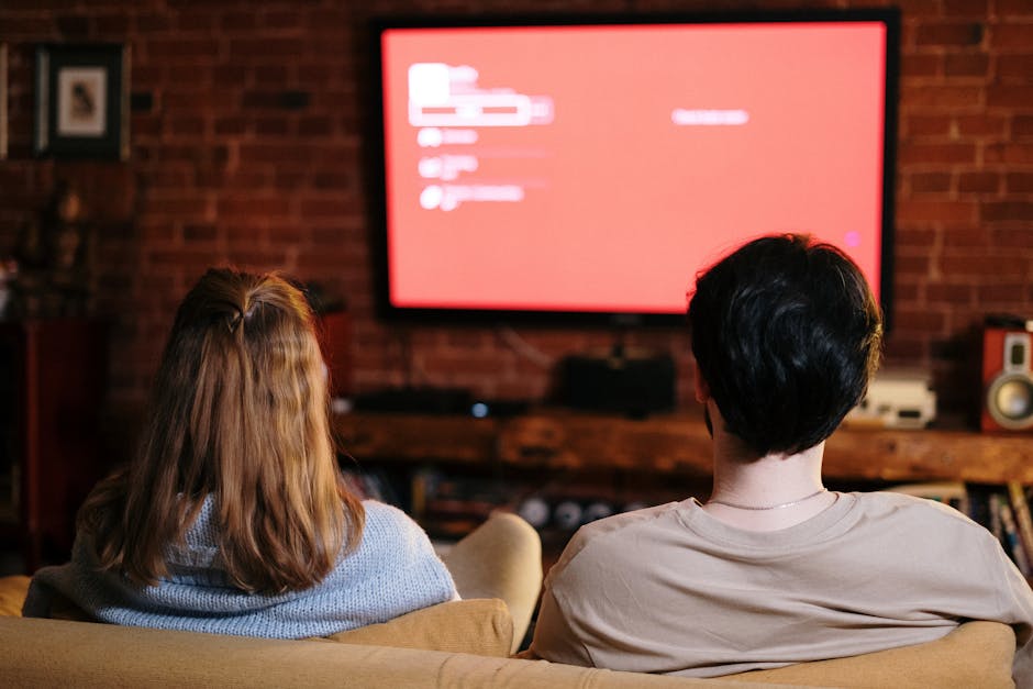 IP television interface met verschillende kanalen en menu's op moderne smart TV in Nederlandse woonkamer